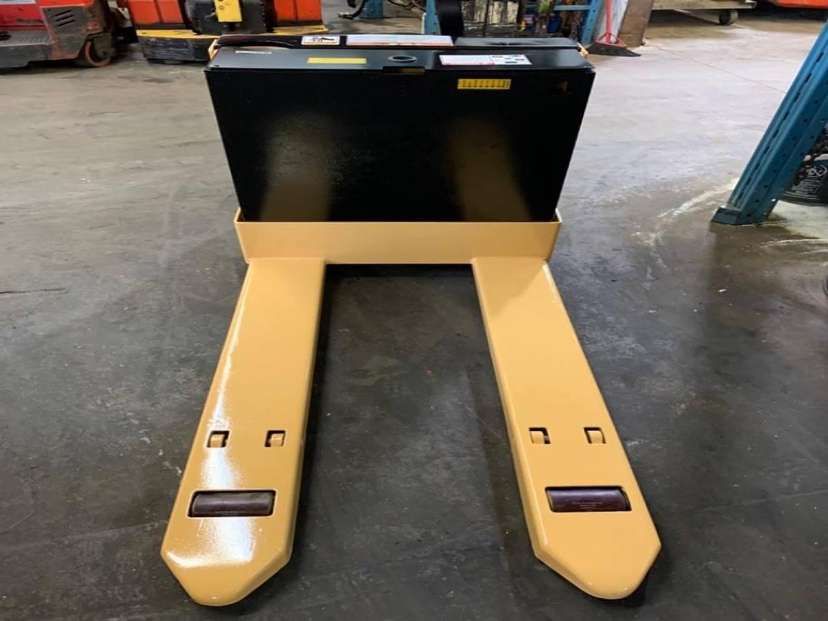 Front view of refurbished 2014 Big Joe WPT45 electric walkie pallet jack showing 27" x 45" forks, power drive chassis, and CSA certification decal during Ontario deployment.