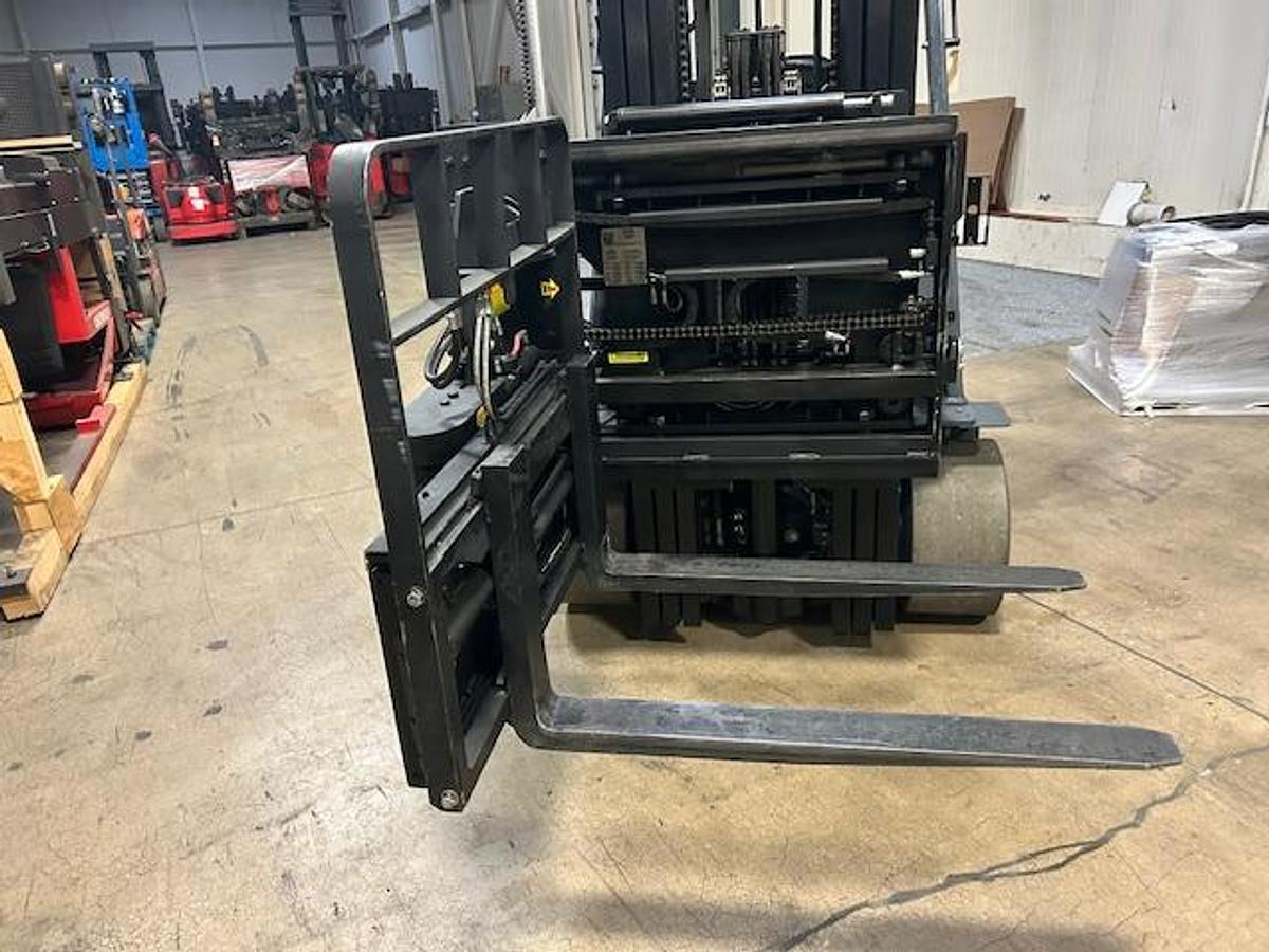 Alternate angle of Superior Swing‑Mast attachment highlighting pivot assembly and carriage structure.