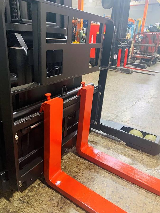 side view of carriage, load backrest and forks