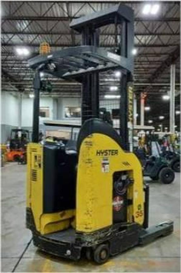 Rear side view of refurbished 2018 Hyster N35ZR2 electric reach truck showing rear chassis, cushion tires, and CSA certification decal during Ontario deployment.