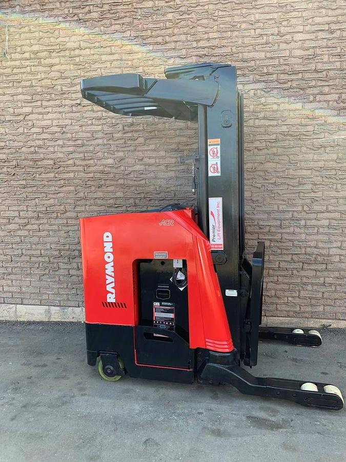 Refurbished 2012 Raymond 750R45TT electric reach truck with CSA certification and new paint deployed in Mississauga for narrow aisle warehouse operations