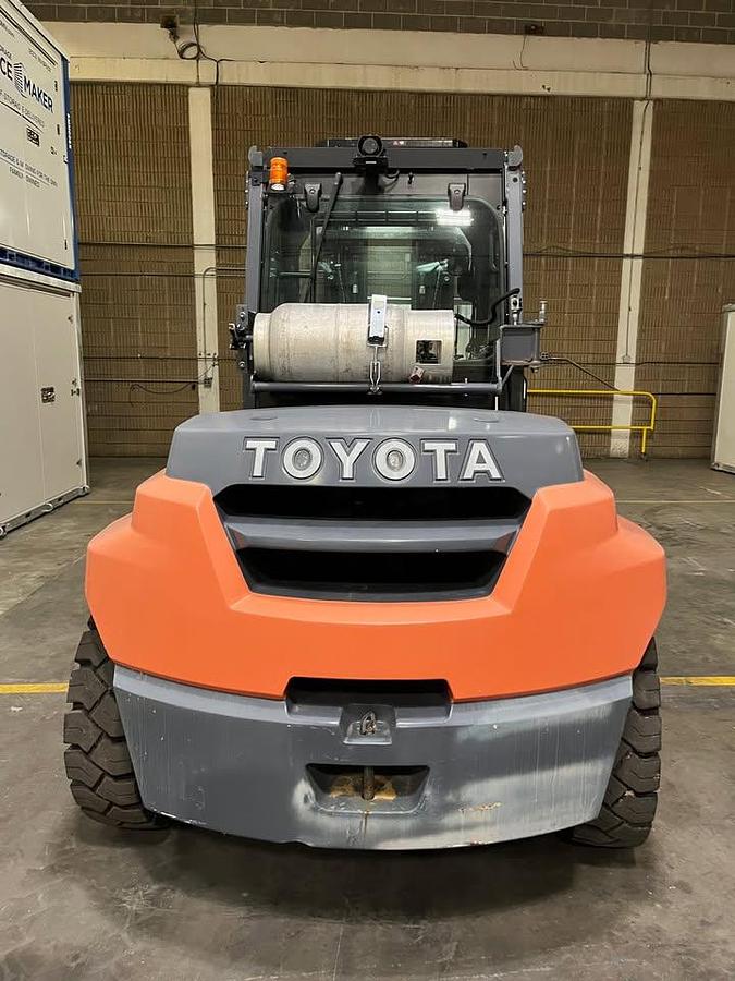 Rear view showing counterweight and mounted safety lighting