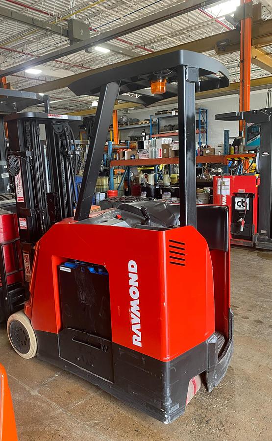 Rear angle view of 2011 Raymond 425‑C40TT Dockstocker – 4,000 lb capacity, 188-inch triple mast, side shift, non‑marking tires, 36V electric forklift, CSA certified