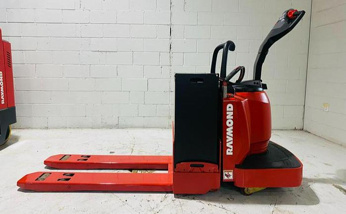 Budget Raymond 8400 walkie pallet jack, older non‑CSA unit with 27×48 forks and 24V electric system.