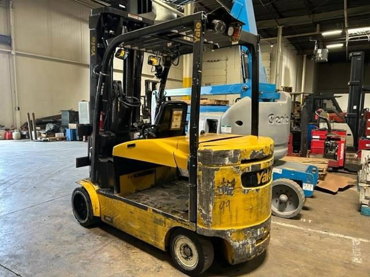 Back view of refurbished 2016 Yale ERC120VHN electric forklift showing counterweight, battery compartment, and CSA inspection tag during Brampton deployment