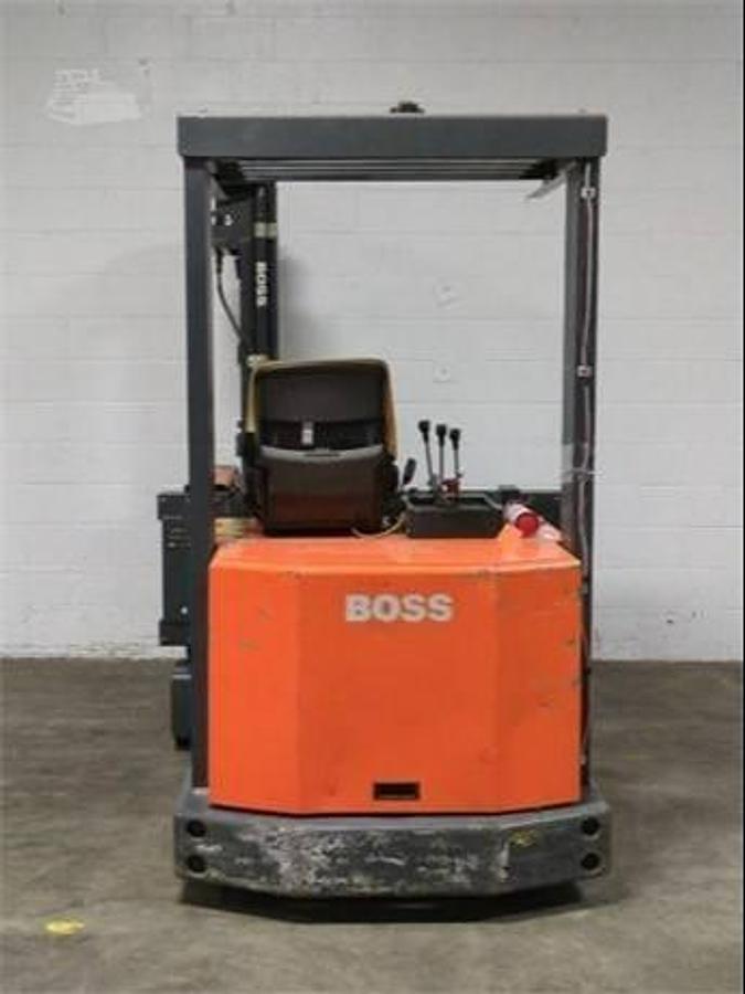 Back view of refurbished 1999 Steinbock VM13 electric swing mast man‑down turret truck showing rear chassis, counterweight, 48 volt battery compartment, solid frame supports, and CSA/MOL certification decal during Brampton deployment.