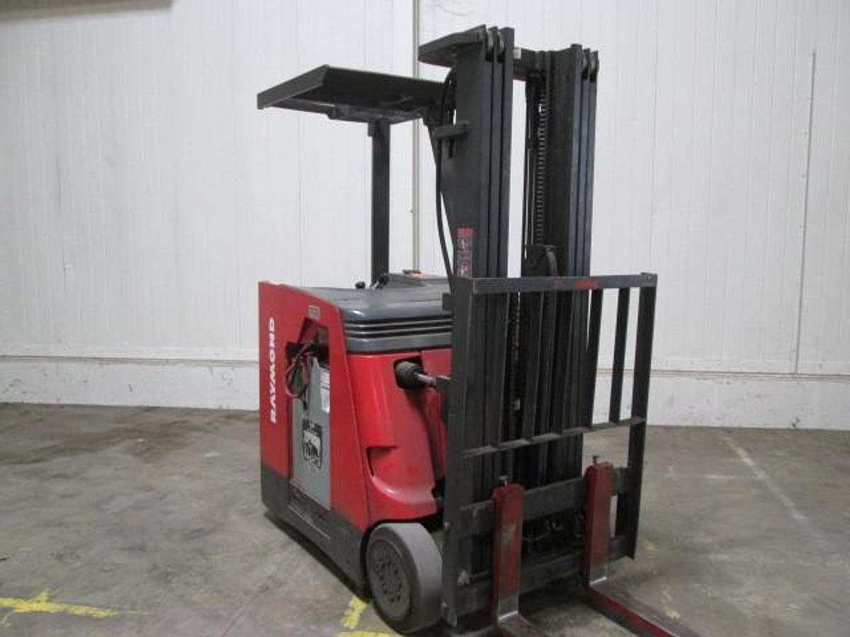 Front angle view of refurbished 2008 Raymond 420-C40TT electric docker showing mast, 42" forks, side shift carriage, and CSA inspection tag during Mississauga deployment