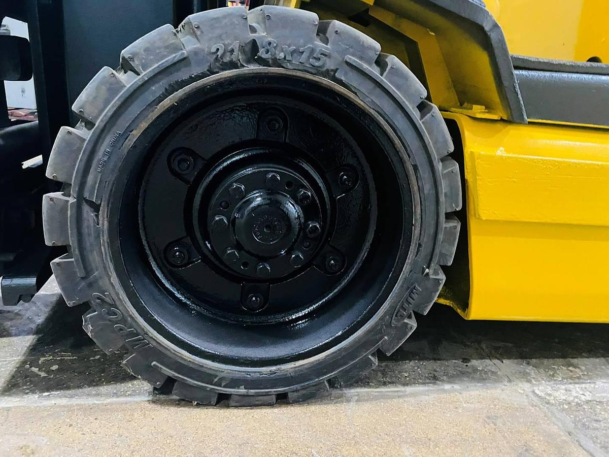 Left drive tire of Budget Yale ERC060RGN older electric forklift, non‑CSA.