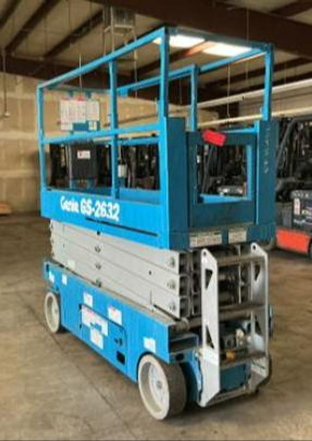Genie GS-2632 narrow electric scissor lift three quarter front view