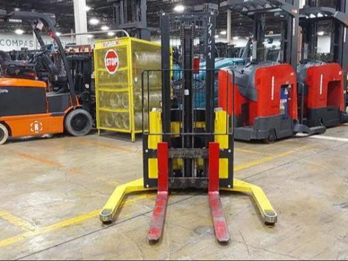 Front view of refurbished 2017 Hyster W30ZA2 electric walkie straddle stacker showing 104" mast, 42" forks, 50" base leg opening, and CSA certification decal during Ontario deployment.