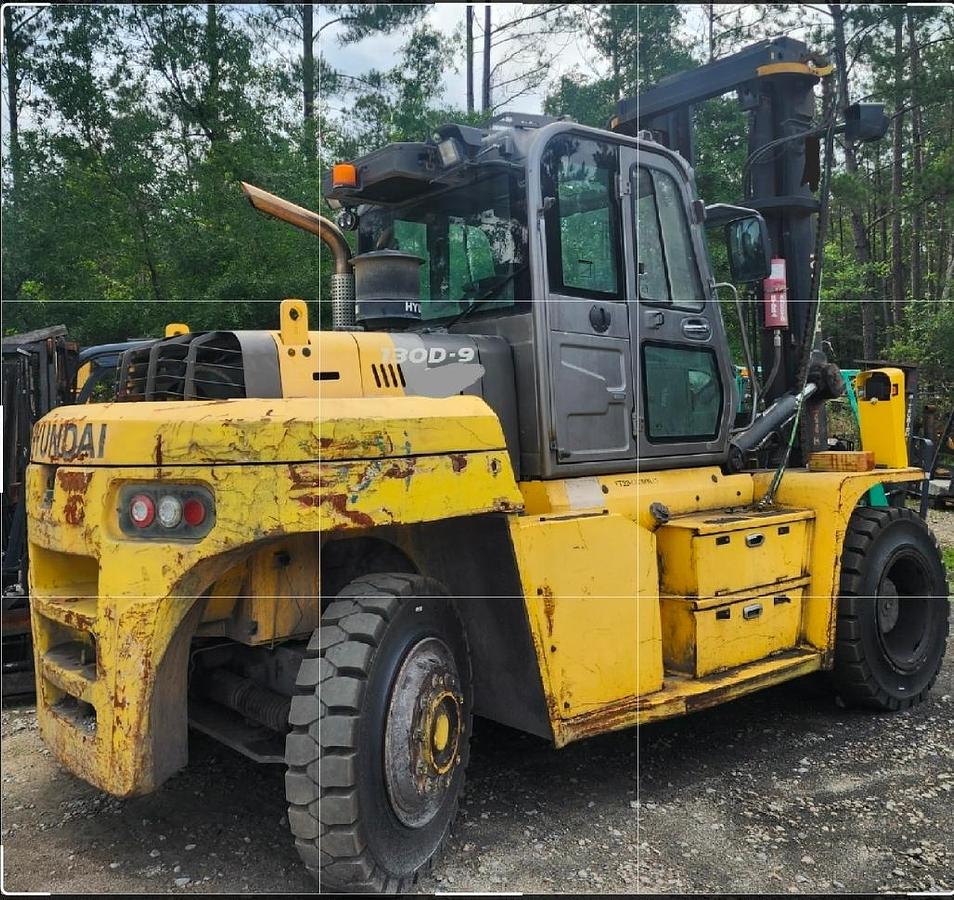2016 Hyundai 130D-9 heavy-capacity diesel forklift side profile showing rugged pneumatic tires and heavy-duty chassis