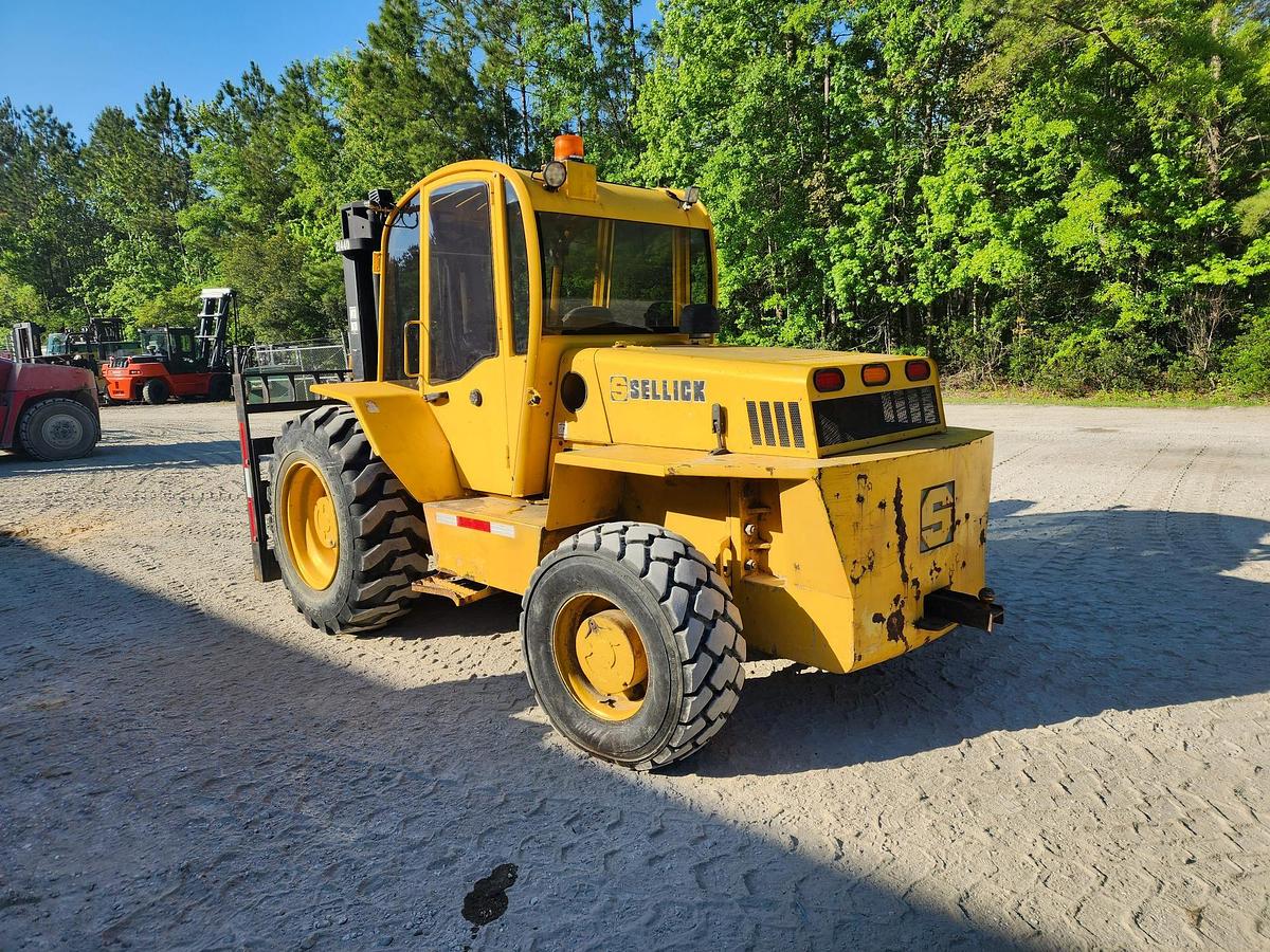 Sellick S100 – rear angle view – counterweight, exhaust stack, rear tire profile – CSA/MOL certified rough terrain forklift – Brampton ON