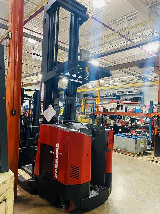 Refurbished 2006 Raymond 740-R45TT electric reach truck with CSA certification and new paint deployed in Mississauga for narrow aisle warehouse operations