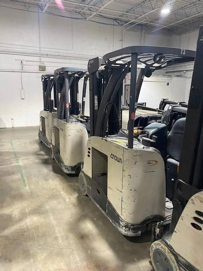 Rear side view of refurbished 2017 Crown RC5545‑40 electric forklift showing rear chassis, 36 volt battery compartment, and CSA certification decal during Ontario deployment.