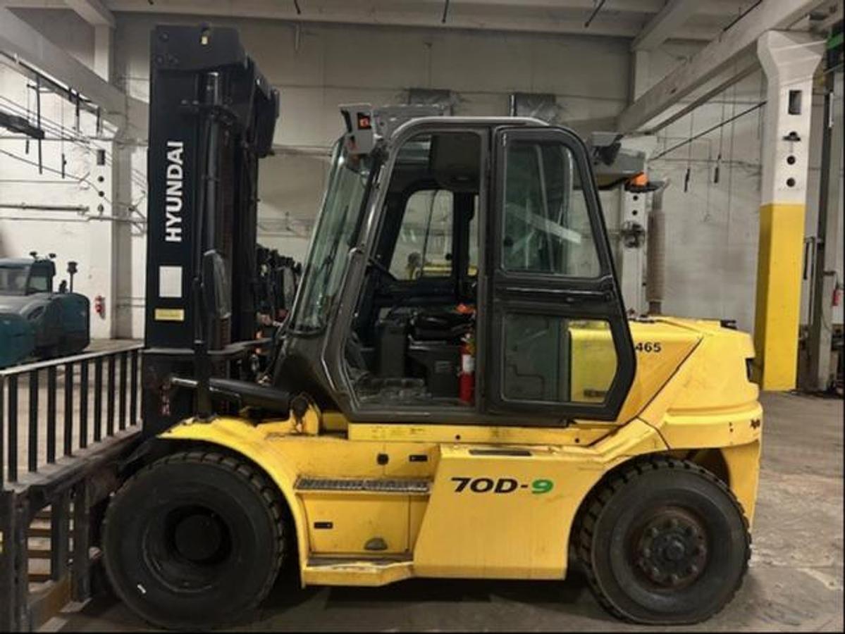 Opposite side view showing full cab and CSA-certified chassis