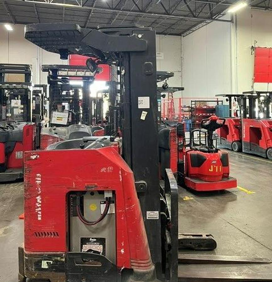 Side view of 2020 Raymond 730‑R45TT single‑reach forklift, 4,500 lb capacity, 95/200 TSU triple mast, 36V electric with side‑shift — refurbished CSA‑certified narrow‑aisle reach truck