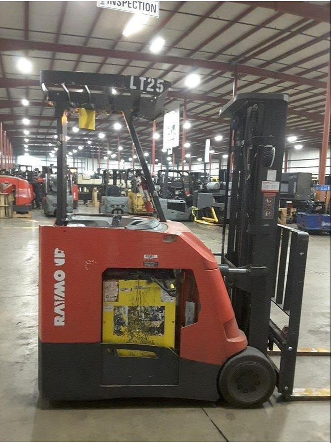 Opposite side view of refurbished 2011 Raymond 425-C40TT electric dockstocker showing reach mechanism, drive unit cover, and chassis structure during Vaughan deployment