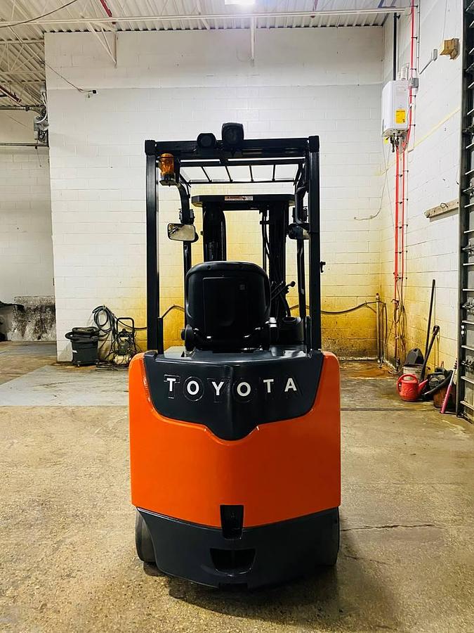 Rear counterweight view of 2019 Toyota 8FBCU32 electric sit-down forklift showing CSA-certified chassis, cushion tires, and branded counterweight – unit staged in Brampton ON