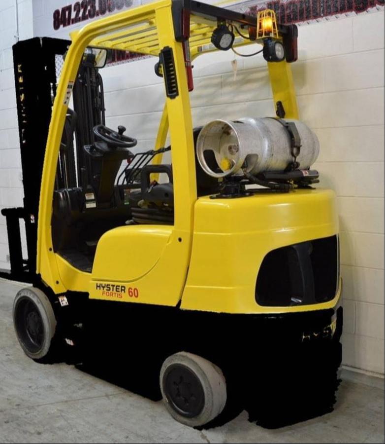 Rear side angle view of Hyster S60FT propane forklift – CSA-certified 6,000 lb indoor unit with 187” triple mast, side-shift carriage, and solid cushion tires – Premier Lift Equipment Brampton ON