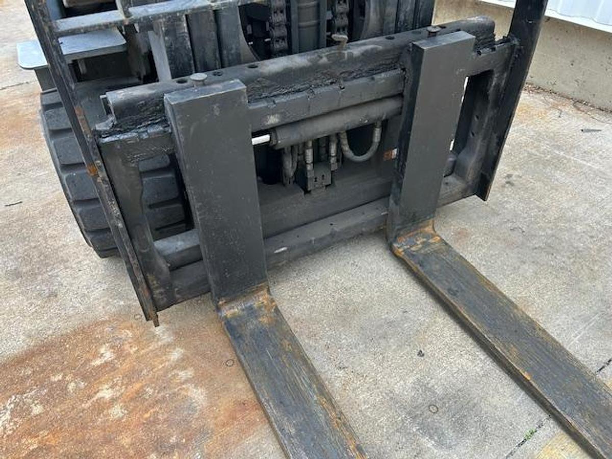 Close-up of side shift and forks on Toyota 7FBCU45 forklift – 48” tapered forks with integral side shift and clamp-ready carriage – Premier Lift Equipment Brampton ON