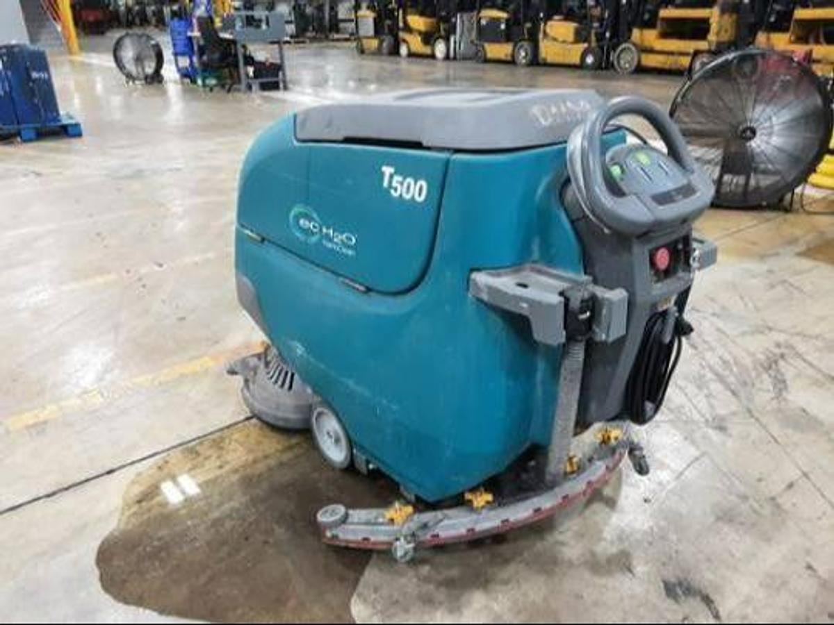 Tennant T500 – opposite rear angle – charger port, tank profile, CSA safety tags – walk-behind scrubber – Brampton ON