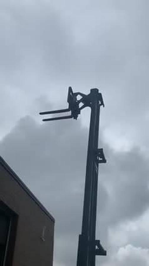 Forks in the air to full height and reach