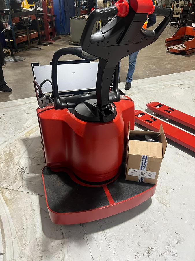 URear view of Budget Raymond 8400 walkie pallet jack, older non‑CSA unit.