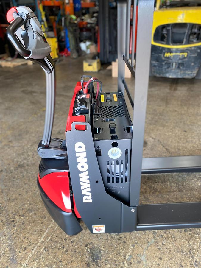 Raymond 8210 – full side profile – tapered forks and compact chassis – CSA certified electric walkie pallet jack – Brampton ON