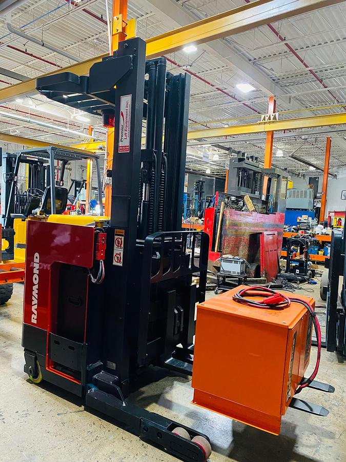 Opposite side view showing compact chassis and CSA-certified labeling and charger