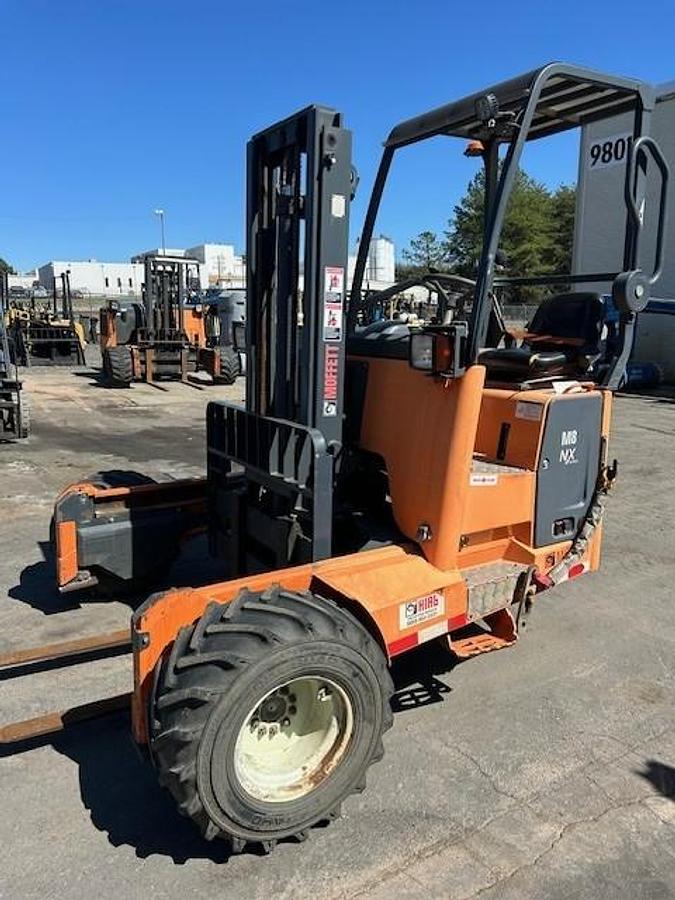 Moffett M8 55.3NX – opposite front angle – mast tilt, cab controls, block forks – CSA-certified truck-mounted forklift – Brampton ON
