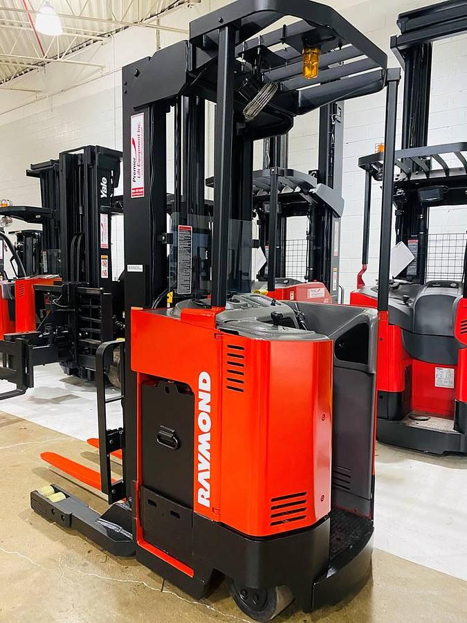 Operator compartment view showing side-stance platform and CSA labeling