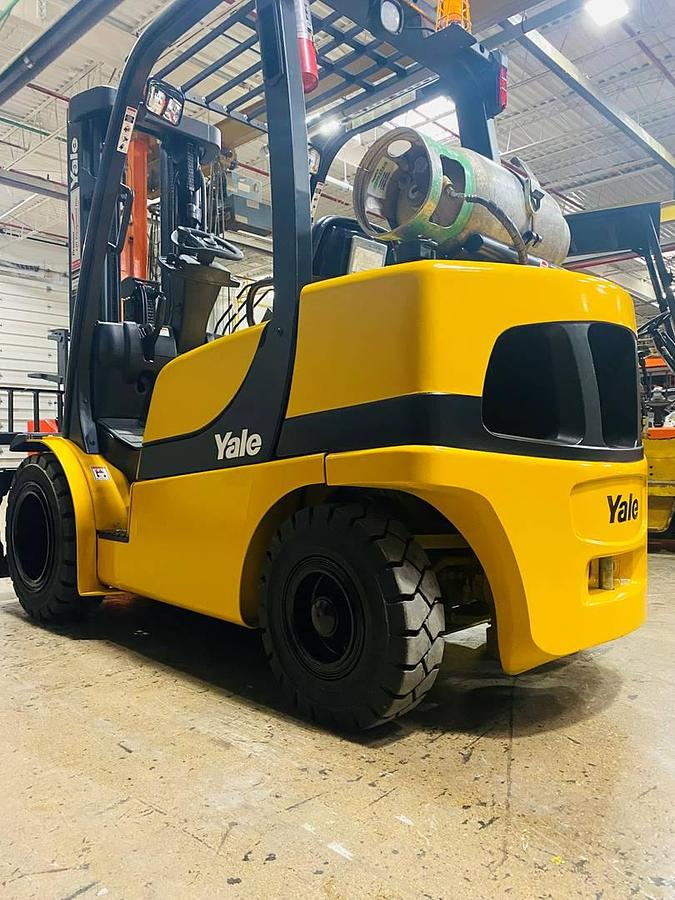 Yale GLP050MX – driver-side rear angle – counterweight, LP safety decals, and solid pneumatic tires – CSA-certified LPG forklift – Brampton ON