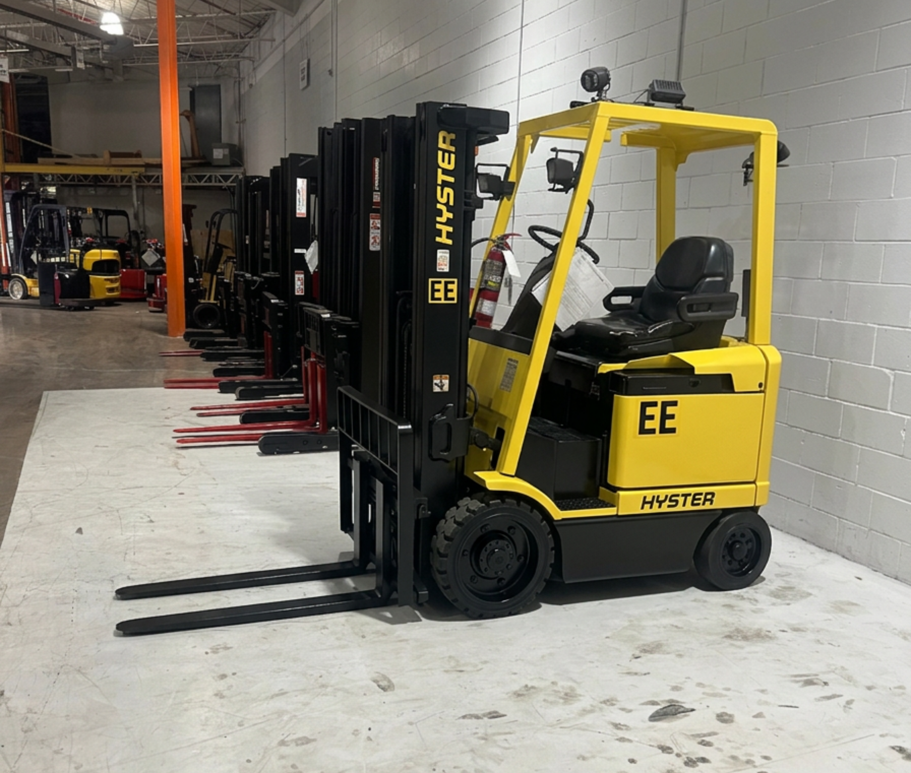 Budget Hyster E45XM‑27 EE‑rated electric forklift, non‑CSA 4,500 lb indoor unit.