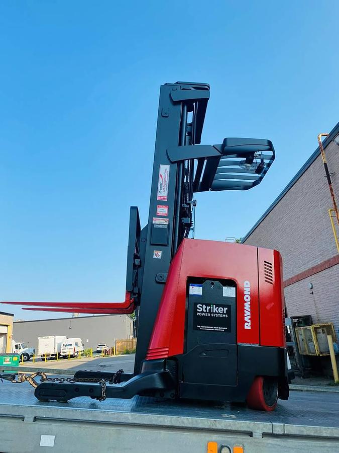 Refurbished 2017 Raymond 750-R45TT electric reach truck with CSA certification and new paint deployed in Mississauga for narrow aisle warehouse operations
