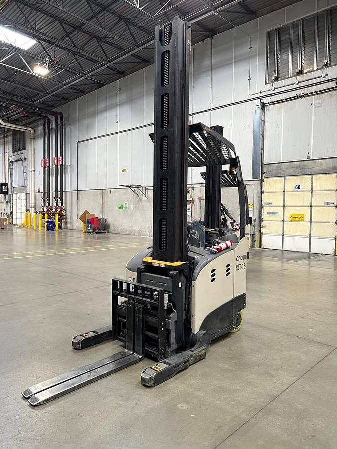 Opposite side view of refurbished 2021 Crown RM6095S electric reach truck showing operator compartment, 42" B.L.O., 53" OBLO, 341" mast, 36 volt battery compartment, and CSA certification decal during Ontario deployment.