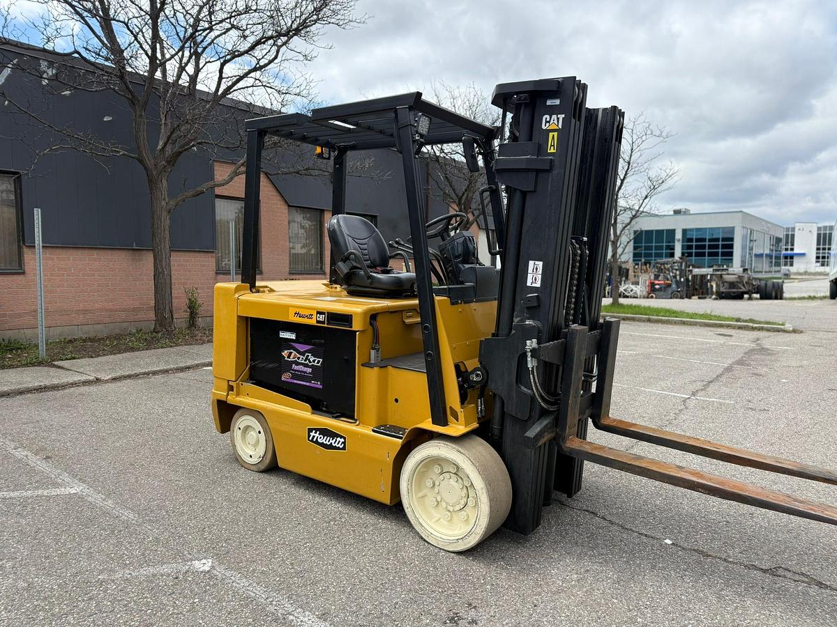 Cat E1000 CSA electric forklift Brampton 10000 lb 209” triple mast fork positioner battery optional 48V clamp-ready indoor export