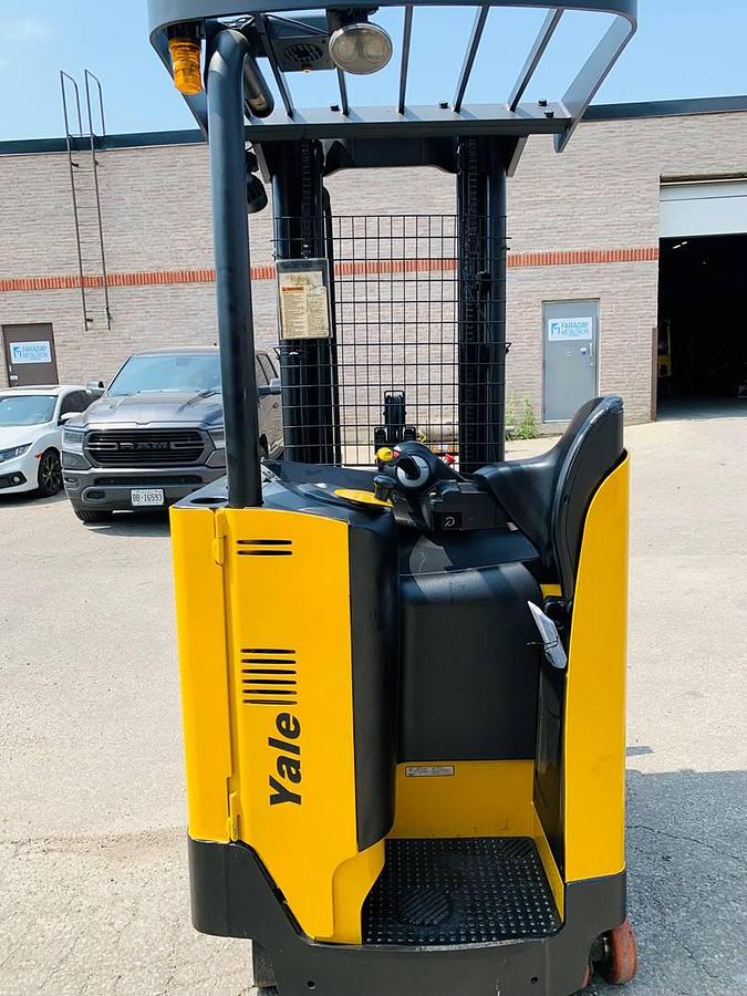 Rear view showing counterweight and mounted safety lighting