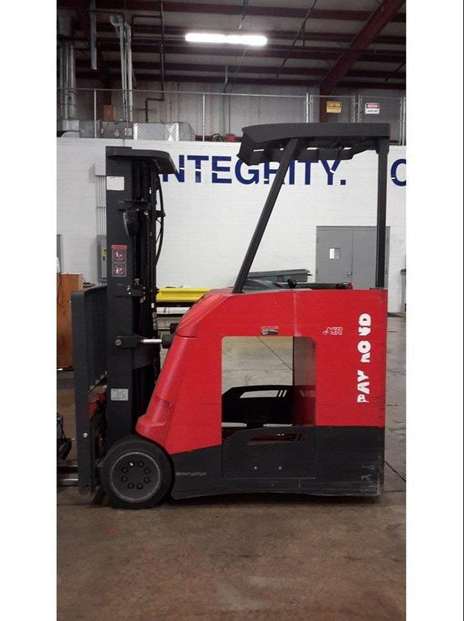 Angled opposite side view of refurbished 2012 Raymond 425-C35TT electric docker showing reach mechanism, drive unit cover, and chassis profile during Vaughan deployment