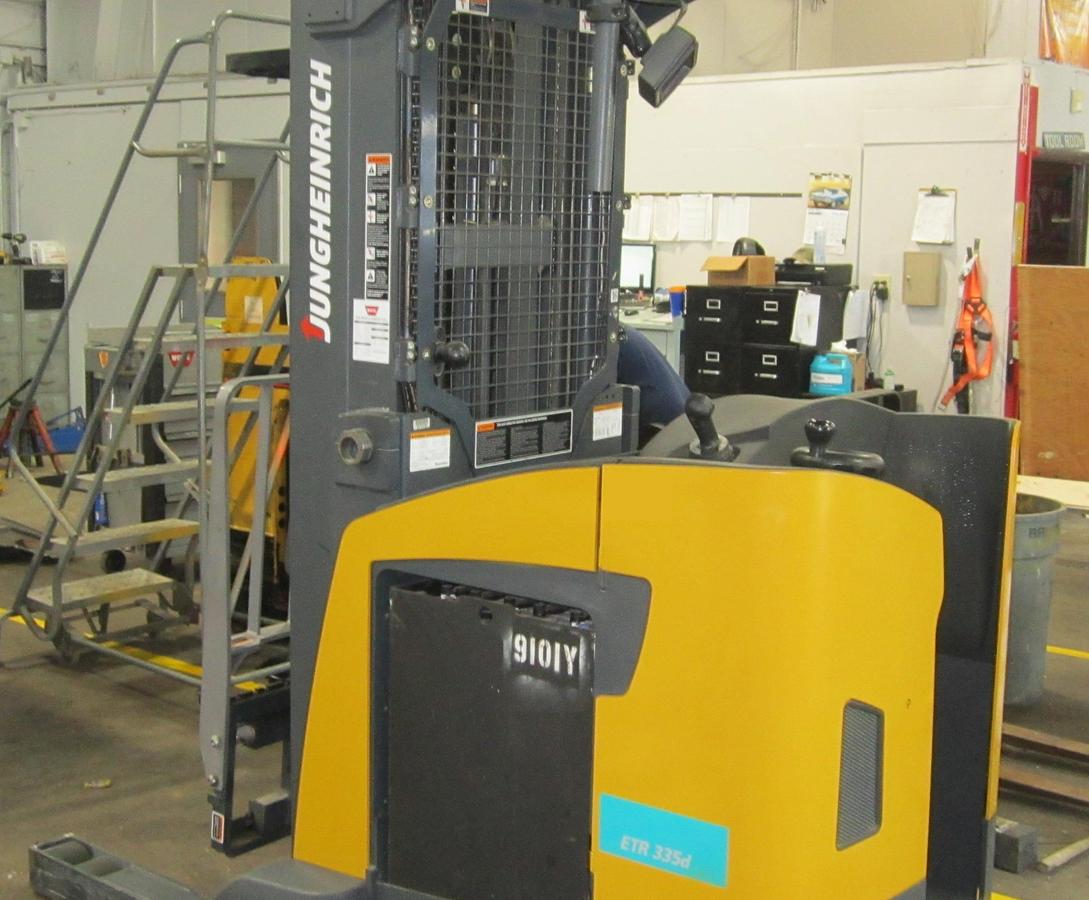 Opposite side view showing battery compartment and CSA-certified chassis