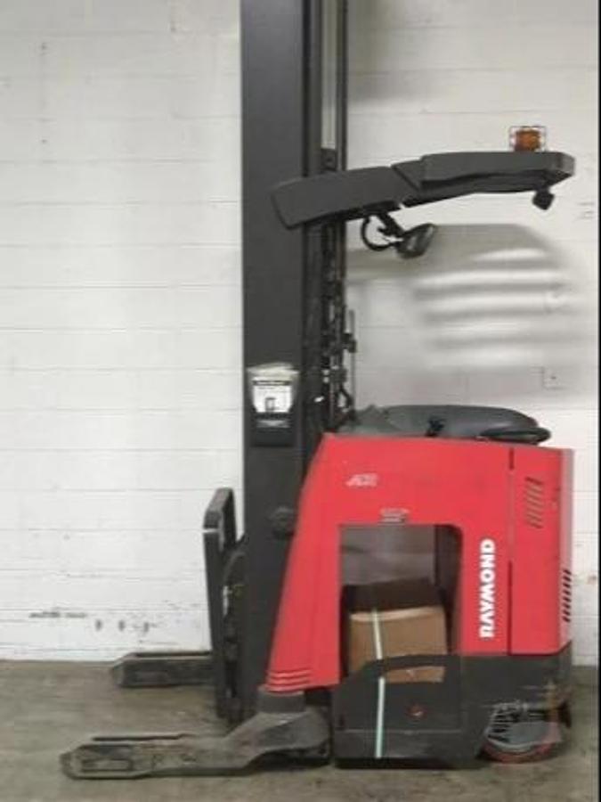 Raymond 750-R45TT reach truck opposite side view | mast rails and battery compartment | CSA certified electric forklift | Brampton ON