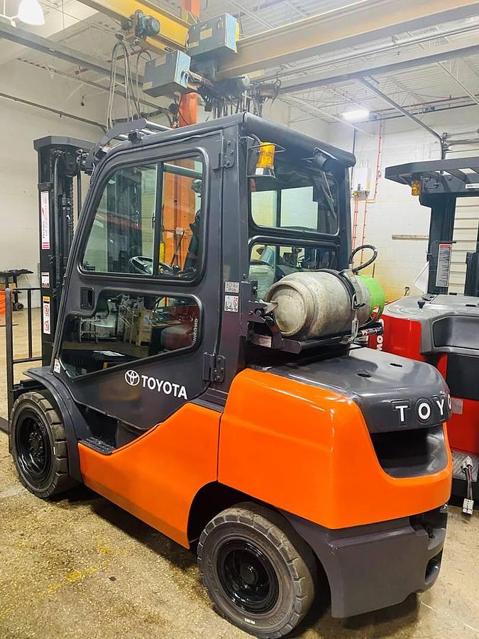 Opposite side view showing LPG tank mount and CSA-certified labeling