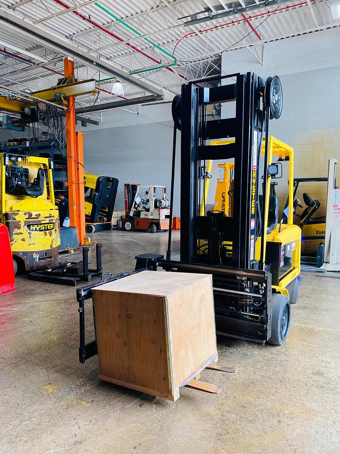 Front view showing Superior Swing Attachment, turret carriage, and CSA certification decal during Ontario deployment.