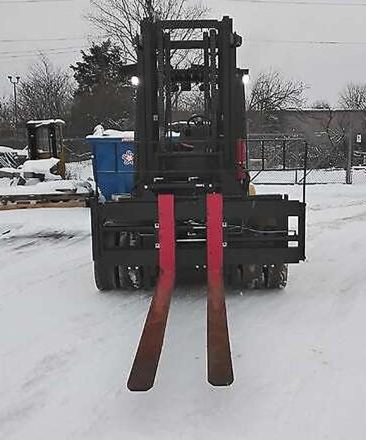 Front angled view showing mast rails and 48” fork tip