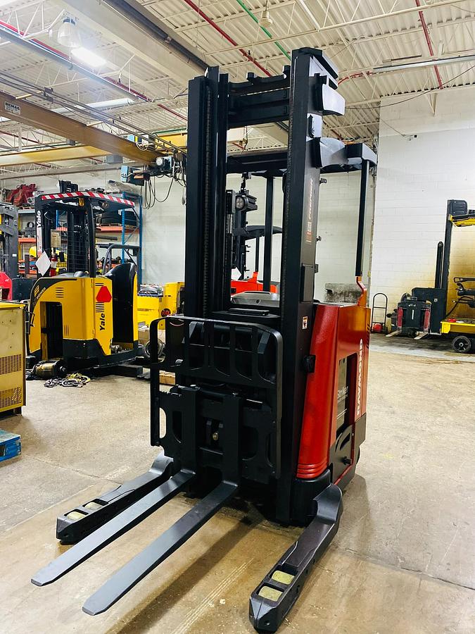 Front view of refurbished Raymond 740-DR32TT double reach forklift – CSA certified, 216” triple mast