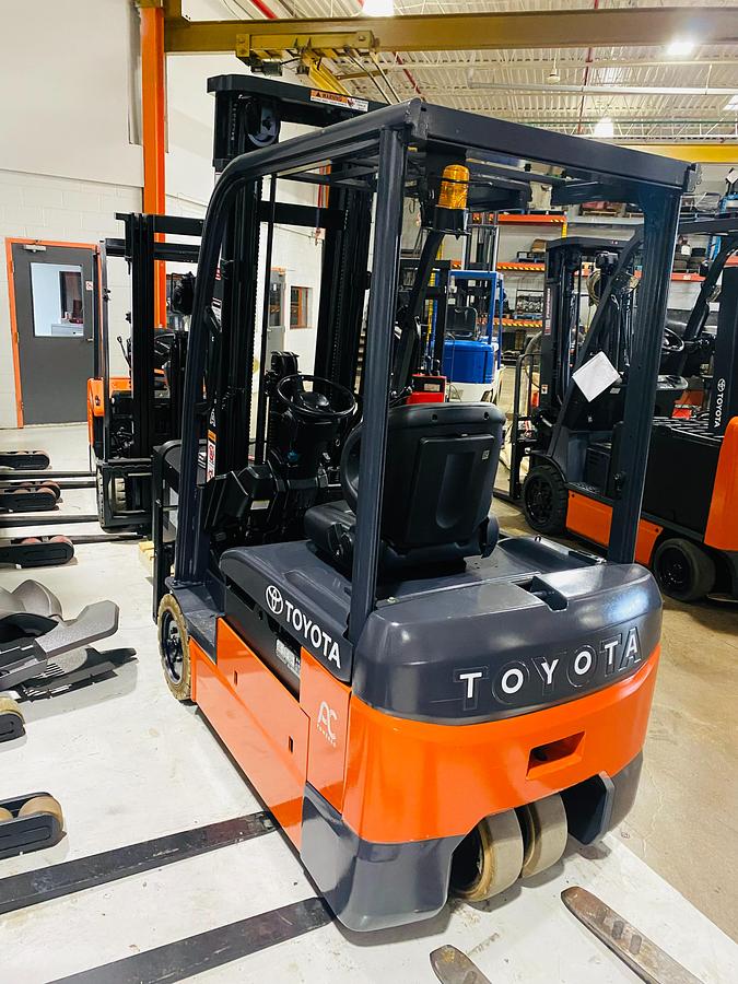 Opposite rear angle of 2019 Toyota 8FBE20U electric forklift highlighting counterweight, steering wheel position, and chassis design