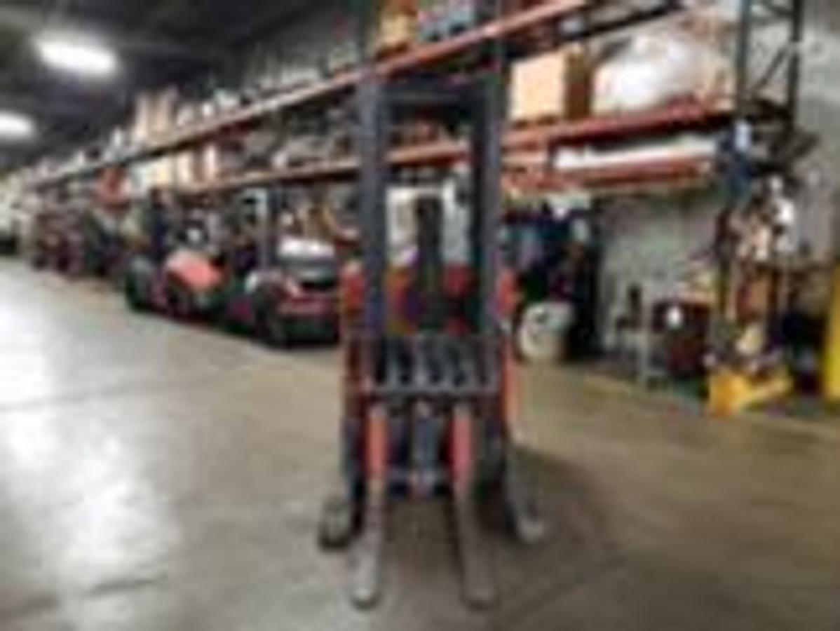 Front angled view showing mast rails and compact chassis profile