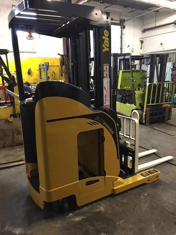 NR040DANS24TE091 reach truck showing operator compartment, battery housing, and CSA compliance markings during Brampton deployment