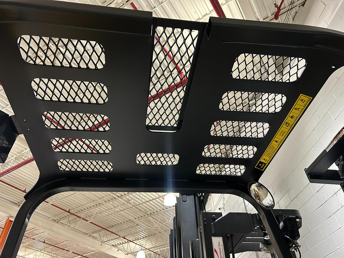 Caterpillar FC40 – overhead guard close-up – safety cage, rear pillars, CSA tag – electric sit-down forklift – Brampton ON