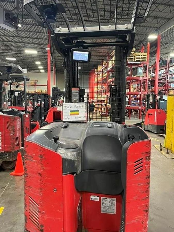 Rear view of 2020 Raymond 730‑R45TT reach truck showing counterweight, chassis condition, and 36V electric powertrain — refurbished CSA‑certified single‑reach forklift