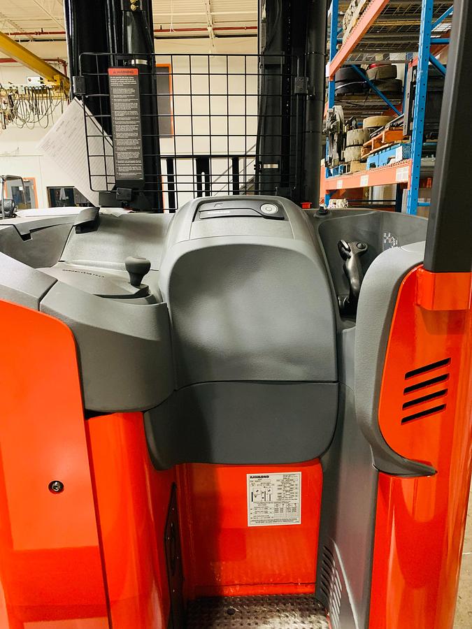 Operator compartment of Raymond 750‑R45TT with heated platform and side‑stance controls